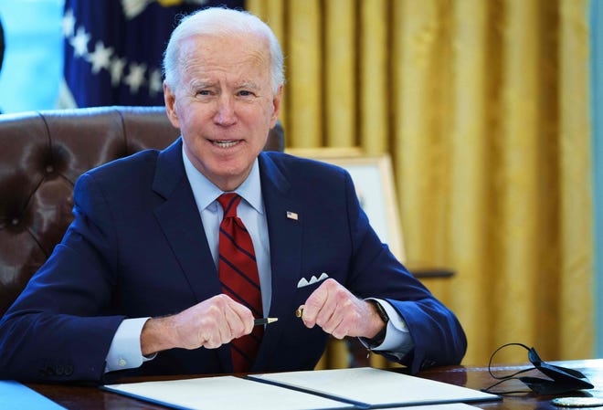 biden signs Federal Worker Minimum Wage Increases to $15